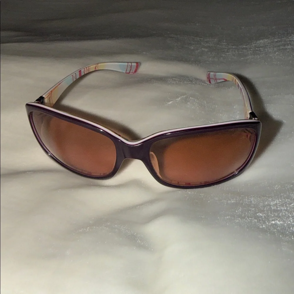 OAKLEY DISCREET Sunglasses in Purple, used condition/flawed